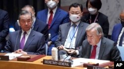 中国外交部长王毅和联合国秘书长古铁雷斯