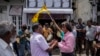 Supporters of Acting President and Prime Minister Ranil Wickremesinghe celebrate after he was elected president in Colombo, Sri Lanka, in Colombo, Sri Lanka, July 20, 2022. 