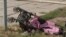 A stroller is seen lying on the ground after Russian missiles strike Vinnytsia, in central Ukraine, killing at least 20 people including three children, in this video grab taken from AFPTV footage July 14, 2022, and released July 15, 2022. 