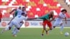 Cameroon's forward Eric Maxim Choupo-Moting is marked by Panama's players during the friendly football match between Cameroon and Panama at the Mohammed Bin Zayed Stadium in Abu Dhabi, Nov. 18, 2022.