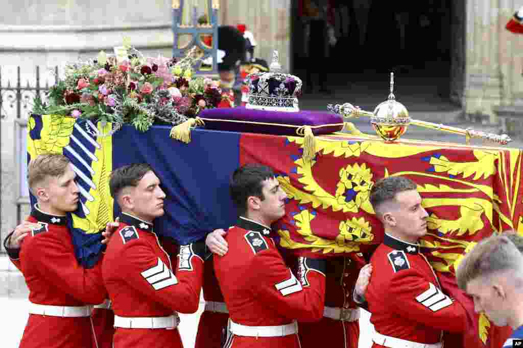 The coffin of Queen Elizabeth II is carried into the Westminster Abbey during her funeral in London, Sept. 19, 2022.