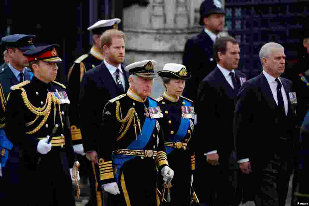 Britain's King Charles, Britain's Anne, Princess Royal, Prince Andrew, Prince Harry and Peter Phillips attend the state funeral and burial of Britain's Queen Elizabeth, at Parliament Square in London, Sept. 19, 2022. 