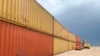 FILE - This photo provided by the Arizona Governor's Office shows shipping containers that will be used to fill a 305-meter gap in the border wall with Mexico near Yuma, Ariz., on Aug. 12, 2022.