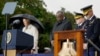 President Joe Biden stands with Defense Secretary Lloyd Austin and Chairman of the Joint Chiefs, Gen. Mark Milley, during a moment of silence during a ceremony at the Pentagon, Sept. 11, 2022.