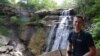 Mikah cools off by a waterfall in Cuyahoga Valley National Park, Ohio. 