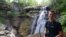 Mikah cools off by a waterfall in Cuyahoga Valley National Park, Ohio. 