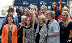 Rep. Martha McSally, R-Ariz., third from left, at a campaign event, Aug. 15, 2018, in Phoenix.