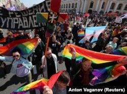 RUSSIA -- Activists from the local LGBT community attend a May Day rally in St. Petersburg, May 1, 2019