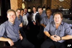 Some of Katzy’s staff members, with one of its owners – Saul Mervis – on the far right