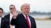 U.S. President Donald Trump arrives to board Air Force One to return to Washington at the conclusion on their holiday vacation, from Palm Beach International Airport in West Palm Beach, Florida, Jan. 1, 2018.