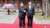 North Korean leader Kim Jong Un shakes hands with Chinese President Xi Jinping in Beijing, as he paid an unofficial visit to China, in this undated photo released by North Korea's Korean Central News Agency in Pyongyang, March 28, 2018. 