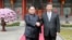 North Korean leader Kim Jong Un shakes hands with Chinese President Xi Jinping in Beijing, as he paid an unofficial visit to China, in this undated photo released by North Korea's Korean Central News Agency in Pyongyang, March 28, 2018. 