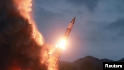 North Korea test fires a new weapon, in this undated photo released Aug. 11, 2019, by North Korea's Korean Central News Agency.