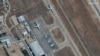 FILE - Several commercial airplanes are seen near the main terminal of the Mazar-i-Sharif airport, in northern Afghanistan, Sept. 3 2021. (Maxar Technologies/Handout via Reuters).