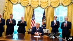 President Donald Trump speaks in the Oval Office of the White House on Friday, Sept. 11, 2020, in Washington. Bahrain has become the latest Arab nation to agree to normalize ties with Israel as part of a broader diplomatic push by Trump and his…