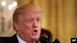 Le president Donald Trump s'exprime depuis la Maison Blanche, Washington , le 13 février 2018