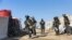 An image obtained from the media office of the Kurdish People's Protection Units in Syria (YPG) March 29, 2021 shows YPG forces conducting a security operation the previous day at the Kurdish-run al-Hol camp. (AFP PHOTO/HO/YPG)