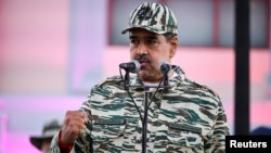 7일 베네수엘라 카라카스에서 니콜라스 마두로 대통령이 3번째 임기를 공식적으로 시작하면서 볼리바르 민병대와 전투원들에게 연설을 진행하고 있다.