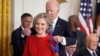Biden honors Clinton, Bono, Goodall, others for contributions