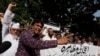 Pakistani journalists chant slogans during protest against attack on political talk show host Hamid Mir, outside the press club in Karachi, April 20, 2014.
