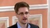 FILE - Former National Security Agency systems analyst Edward Snowden speaks in Moscow, Oct. 11, 2013, in this image made from video and released by WikiLeaks.
