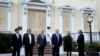 FILE - President Donald Trump stands outside St. John's Church, June 1, 2020, in Washington. Standing with Trump are Mark Esper, from left, William Barr, Robert O'Brien, Kayleigh McEnany and Mark Meadows.