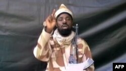 Hoton da aka ciro asabar 13 Yuli, 2013 daga wani faifan bidiyo da shugaban kungiyar Boko Haram, Abubakar Shekau, yayi.