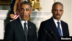 اریک هولدر، دادستان کل و باراک اوباما رئیس جمهوری آمریکا 