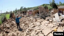 22일 중국 간쑤성 딩시시의 지진 피해현장.