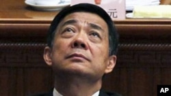 Mitt Romney and President Barack Obama wave to the crowd following the first presidential debate in Denver, Colorado, October 3, 2012