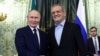 Iranian president in Moscow for treaty signing with Putin