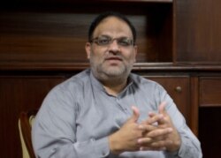 FILE - Salim Uddin, a spokesman of the Pakistani Ahmadiyya community talks to The Associated Press in Islamabad, Pakistan, Sept. 26, 2018.