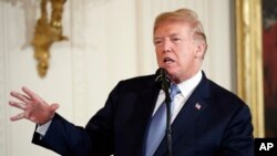 Le président Donald Trump lors d'une cérémonie dans la salle Est de la Maison Blanche à Washington, le 26 juin 2018.