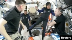 Mission specialists Ali Alqarni and Rayyanah Barnawi arrive on the International Space Station.