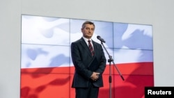 Poland's parliament speaker Marek Kuchcinski speaks during a news conference in Warsaw, Poland, Aug. 8, 2019. 