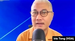 时事评论员黄伟国表示，失去国际化特色的香港，如何吸引中国大陆新移民也是疑问。 (美国之音汤惠芸)