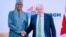 Shugaba Buhari, hagu, Firaministan Birtaniya, Boris Johnson a taron CHOGM (Hoto: Facebook/Fadar shugaban kasa)