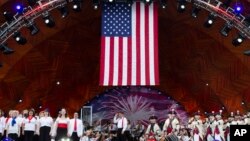 Keith Lockhart, center, conducts during rehearsals for the annual Fourth of July Boston Pops Fireworks Spectacular, July 3, 2022, in Boston, Massachusetts.