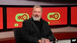 Novaya Gazeta editor Dmitry Muratov at the Ekho Moskvy (Echo of Moscow) radio station live broadcast in Moscow, Russia, Oct. 8, 2021. The 2021 Nobel Peace Prize has been awarded to journalists Maria Ressa of the Philippines and Muratov of Russia. Muratov 