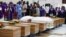Coffins are pictured during a une 17, 2022, memorial service for victims killed during an attack by gunmen during a June 5 mass at St. Francis Catholic Church, in Owo, Ondo, Nigeria. 