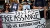 Supporters hold a banner during a protest against the extradition of WikiLeaks' founder Julian Assange from Britain to the U.S., in Athens, Greece, June 20, 2022. 