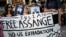 Supporters hold a banner during a protest against the extradition of WikiLeaks' founder Julian Assange from Britain to the U.S., in Athens, Greece, June 20, 2022. 