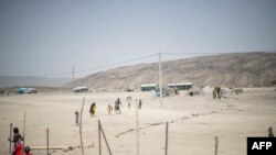 በሰሜን ኢትዮጵያ ያገረሸውን ጦርነት ተከትሎ የተፈናቀሉ የተጠለሉበት በአፋር ክልል ሰመራ 100 ኪ.ሜ ርቀት ላይ የሚገኘው ጉያህ የስደተኞች መጠለያ ጣቢያ እአአ በ5/17/2022 