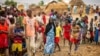FILE - Refugees are seen gathered at Minawao Refugee Camp in northern Cameroon, April 18, 2016. The U.N. refugee agency has called on Cameroon to stop forcibly repatriating Nigerians refugees on its territory. 