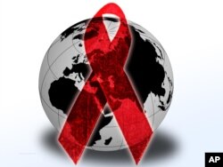 Red AIDS ribbon over globe
