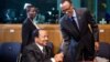 Rwanda President Paul Kagame, right, greets Cameroon President Paul Biya as he arrives for a meeting on Central African Republic, Brussels, April 2, 2014.