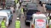 A convoy carrying doctors, medicines and activists with the Falah-e-Insaniat Foundation passes through Chakothi's main bazaar near the Line of Control along the Indian border, 61 kilometers from Muzaffarabad, Pakistan, Aug. 2, 2016.