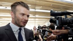 David Beckham saat mengumumkan akan membeli tim ekspansi Major League Soccer di Miami, Februari 2014. (AP/Lynne Sladky)