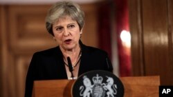 Firai Ministar Birtaniya Theresa May a yayin da take bada jawabin daidaitawa a taron koli na tarayyar turai a 10 Downing Street, in London, Sept. 21, 2018. 