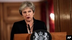 British Prime Minister Theresa May makes a statement on Brexit negotiations with the European Union, at 10 Downing Street, in London, Sept. 21, 2018. 